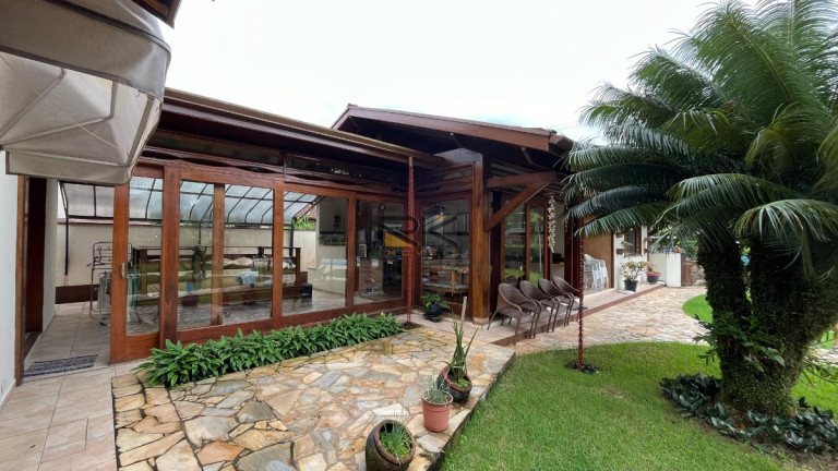 Imagem Casa de Condomínio com 4 Quartos à Venda, 310 m² em Horto Florestal - Ubatuba