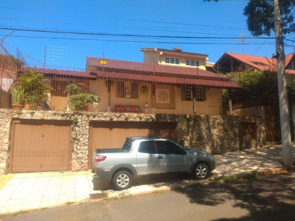 Imagem Imóvel com 4 Quartos à Venda, em Santa Tereza - Porto Alegre Imagem Imóvel com 4 Quartos à Venda, em Santa Tereza - Porto Alegre