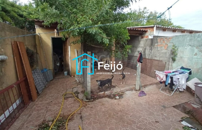 Imagem Casa com 2 Quartos à Venda, 51 m² em Hípica - Porto Alegre Imagem Casa com 2 Quartos à Venda, 51 m² em Hípica - Porto Alegre