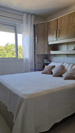 Imagem Imóvel com 2 Quartos à Venda, 57 m² em Vila Nova - Porto Alegre Imagem Imóvel com 2 Quartos à Venda, 57 m² em Vila Nova - Porto Alegre
