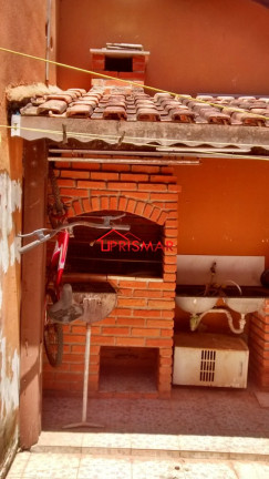 Imagem Casa com 2 Quartos à Venda, 110 m² em Vila Guilhermina - Praia Grande