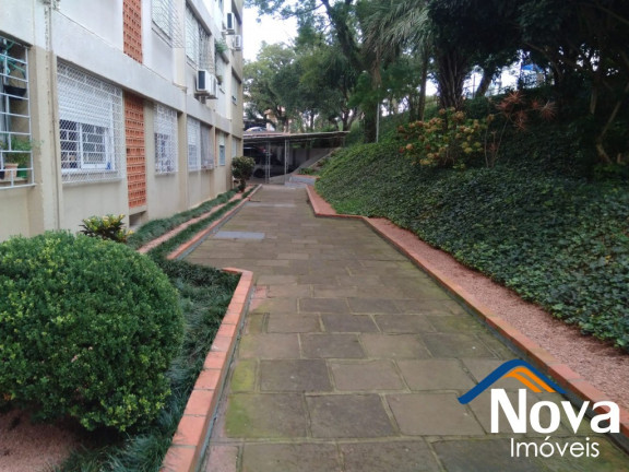 Imagem Imóvel com 2 Quartos à Venda, 79 m² em Santo Antônio - Porto Alegre Imagem Imóvel com 2 Quartos à Venda, 79 m² em Santo Antônio - Porto Alegre