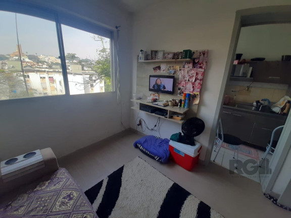 Imagem Apartamento com 1 Quarto à Venda, 60 m² em Santo Antônio - Porto Alegre Imagem Apartamento com 1 Quarto à Venda, 60 m² em Santo Antônio - Porto Alegre