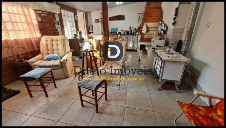 Imagem Casa com 4 Quartos à Venda, 284 m² em Camobi - Santa Maria