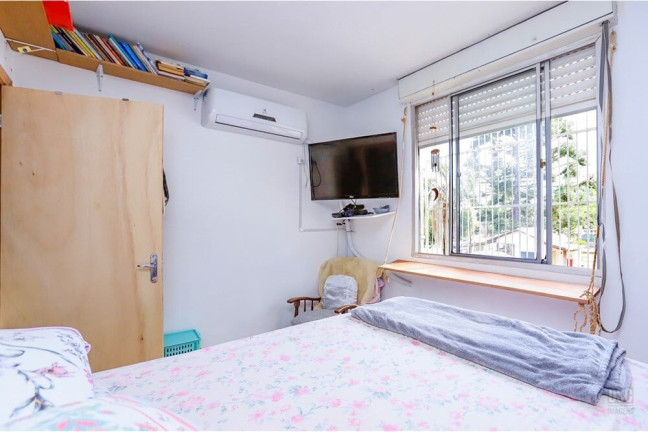 Imagem Imóvel com 2 Quartos à Venda, 50 m² em Vila Nova - Porto Alegre Imagem Imóvel com 2 Quartos à Venda, 50 m² em Vila Nova - Porto Alegre