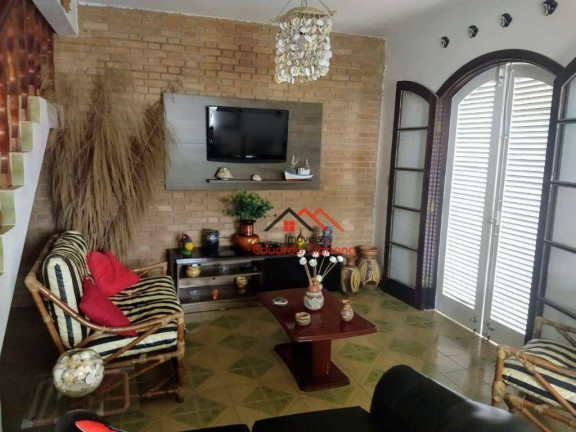 Imagem Sobrado com 4 Quartos à Venda, 218 m² em Massaguaçu - Caraguatatuba