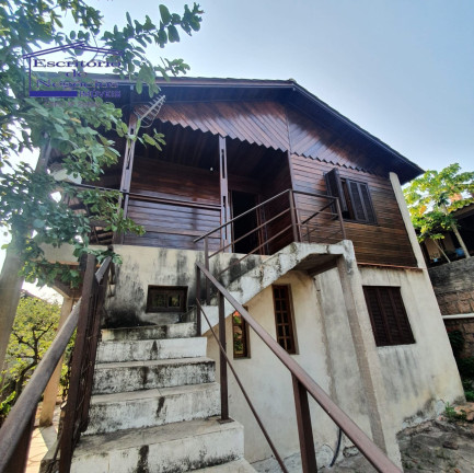 Imagem Casa com 3 Quartos à Venda, 200 m² em Vila Nova - Porto Alegre Imagem Casa com 3 Quartos à Venda, 200 m² em Vila Nova - Porto Alegre
