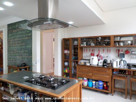 Imagem Casa com 5 Quartos à Venda, 609 m² em Jardim Guedala - São Paulo