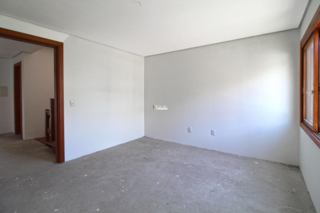 Imagem Casa com 3 Quartos à Venda, 240 m² em Vila Nova - Porto Alegre Imagem Casa com 3 Quartos à Venda, 240 m² em Vila Nova - Porto Alegre