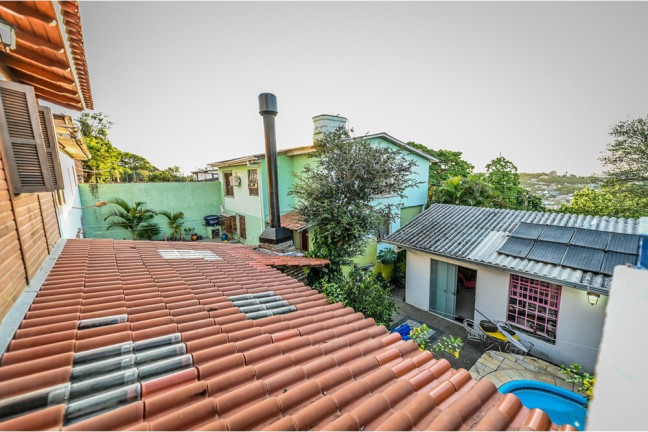 Imagem Casa com 4 Quartos à Venda, 200 m² em Santa Tereza - Porto Alegre Imagem Casa com 4 Quartos à Venda, 200 m² em Santa Tereza - Porto Alegre