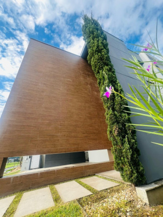 Imagem Sobrado com 4 Quartos à Venda, 688 m² em Santa Regina - Camboriú