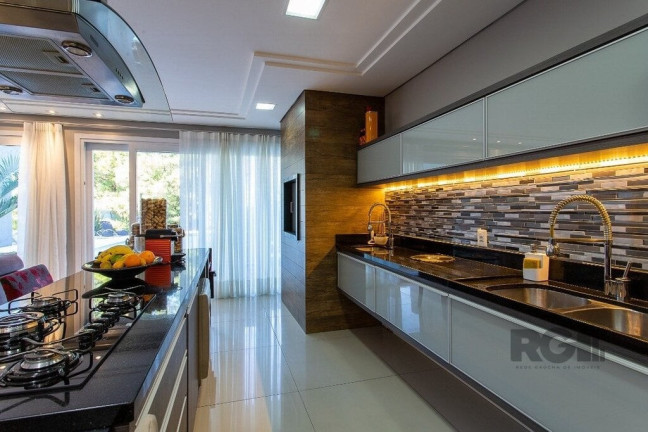 Imagem Imóvel com 4 Quartos à Venda, 219 m² em Belém Novo - Porto Alegre