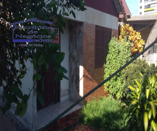 Imagem Casa com 5 Quartos à Venda, 200 m² em Camaquã - Porto Alegre Imagem Casa com 5 Quartos à Venda, 200 m² em Camaquã - Porto Alegre