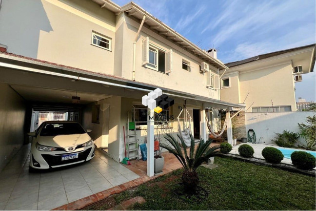 Imagem Casa com 4 Quartos à Venda, 243 m² em Moinhos De Vento - Canoas Imagem Casa com 4 Quartos à Venda, 243 m² em Moinhos De Vento - Canoas