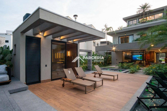 Imagem Casa com 7 Quartos à Venda, 670 m² em Riviera Módulo 12 - Bertioga Imagem Casa com 7 Quartos à Venda, 670 m² em Riviera Módulo 12 - Bertioga