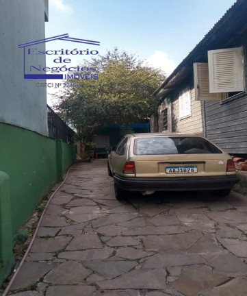 Imagem Casa com 6 Quartos à Venda, 150 m² em Cavalhada - Porto Alegre