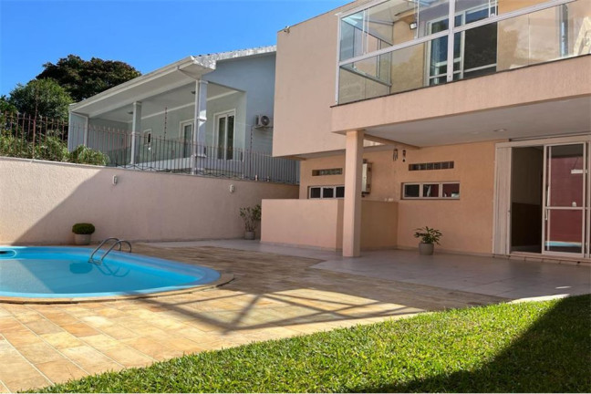 Imagem Casa com 4 Quartos à Venda, em Nonoai - Porto Alegre Imagem Casa com 4 Quartos à Venda, em Nonoai - Porto Alegre