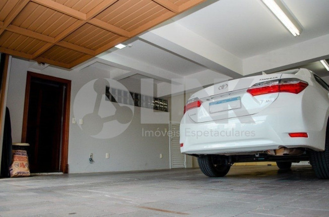 Imagem Casa com 5 Quartos à Venda, 550 m² em Chácara Das Pedras - Porto Alegre Imagem Casa com 5 Quartos à Venda, 550 m² em Chácara Das Pedras - Porto Alegre