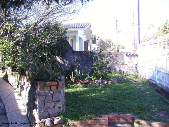 Imagem Casa com 5 Quartos à Venda, 216 m² em Pé De Plátano - Santa Maria
