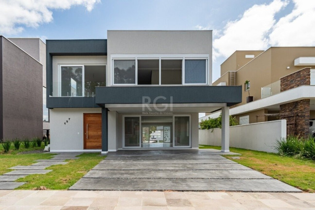 Imagem Casa de Condomínio com 3 Quartos à Venda, 300 m² em Vila Nova - Porto Alegre Imagem Casa de Condomínio com 3 Quartos à Venda, 300 m² em Vila Nova - Porto Alegre