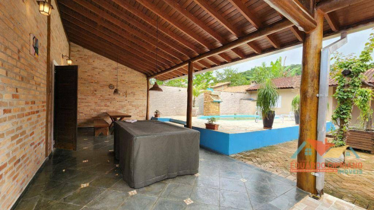 Imagem Casa com 4 Quartos à Venda, 239 m² em Massaguaçu - Caraguatatuba