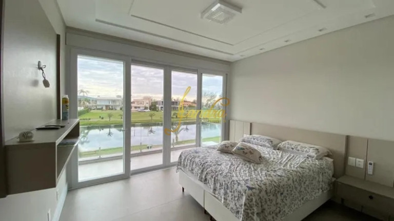 Imagem Casa de Condomínio com 5 Quartos à Venda, 560 m² em Centro - Torres
