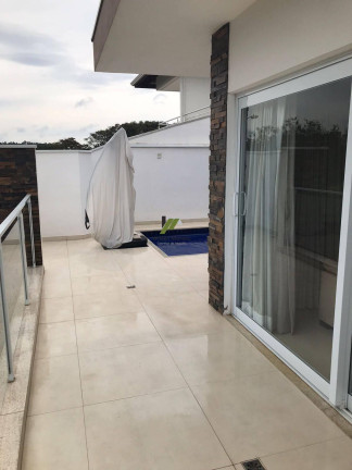 Imagem Casa de Condomínio com 3 Quartos à Venda, 220 m²