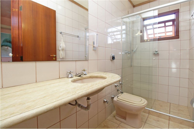 Imagem Casa com 5 Quartos à Venda, em Glória - Porto Alegre Imagem Casa com 5 Quartos à Venda, em Glória - Porto Alegre