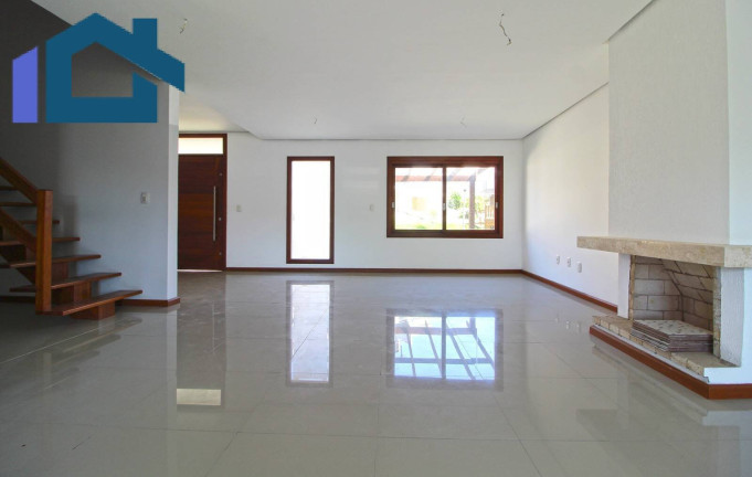Imagem Sobrado com 3 Quartos à Venda, 224 m² em Vila Nova - Porto Alegre