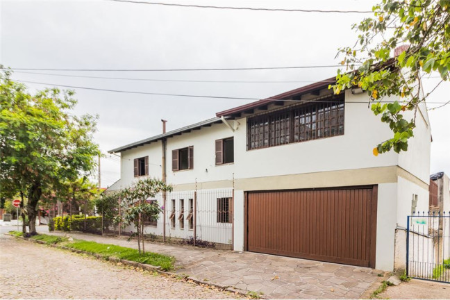 Imagem Casa com 4 Quartos à Venda, 313 m² em Cavalhada - Porto Alegre Imagem Casa com 4 Quartos à Venda, 313 m² em Cavalhada - Porto Alegre