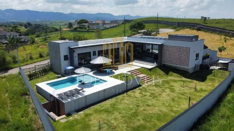Imagem Casa com 4 Quartos à Venda, 1.250 m² em Condomínio Colinas Do Parahyba - São José Dos Campos