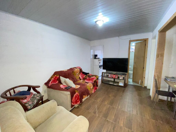Imagem Casa com 2 Quartos à Venda, em Costa E Silva - Porto Alegre Imagem Casa com 2 Quartos à Venda, em Costa E Silva - Porto Alegre
