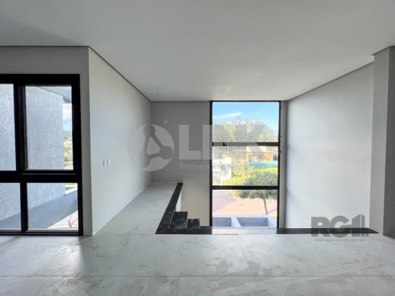 Imagem Imóvel com 4 Quartos à Venda, 371 m² em Vila Nova - Porto Alegre Imagem Imóvel com 4 Quartos à Venda, 371 m² em Vila Nova - Porto Alegre