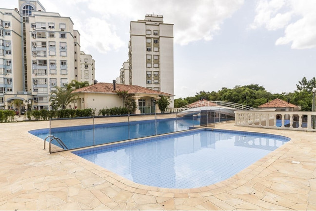 Imagem Imóvel com 3 Quartos à Venda, 74 m² em Cavalhada - Porto Alegre