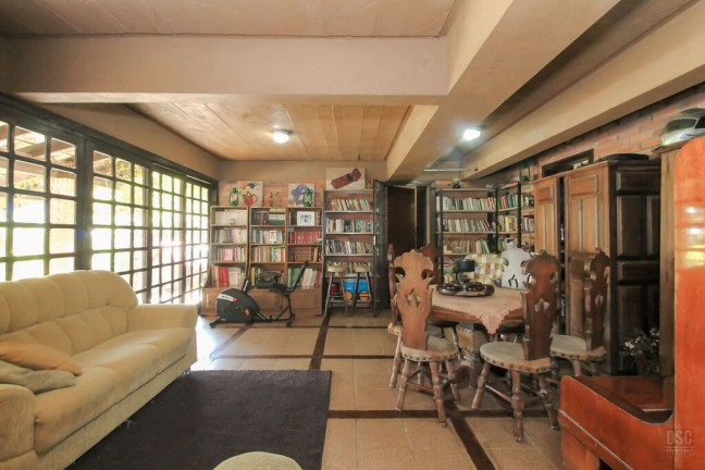 Imagem Casa com 4 Quartos à Venda, 200 m² em Vila Nova - Porto Alegre Imagem Casa com 4 Quartos à Venda, 200 m² em Vila Nova - Porto Alegre