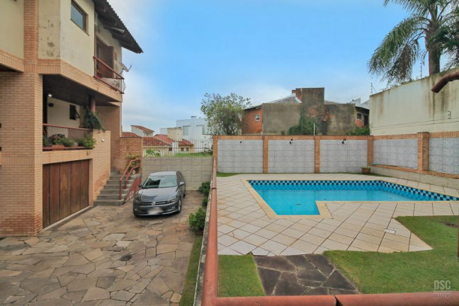Imagem Casa com 3 Quartos à Venda, 183 m² em Ipanema - Porto Alegre Imagem Casa com 3 Quartos à Venda, 183 m² em Ipanema - Porto Alegre
