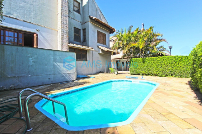 Imagem Casa com 3 Quartos à Venda, 179 m² em Cristal - Porto Alegre Imagem Casa com 3 Quartos à Venda, 179 m² em Cristal - Porto Alegre