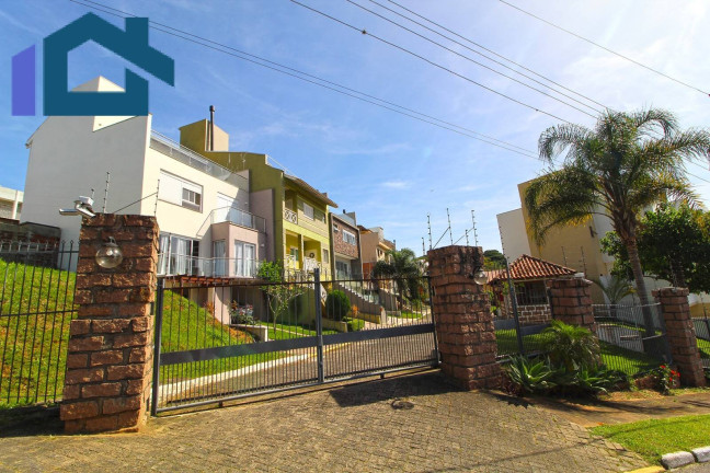 Imagem Sobrado com 3 Quartos à Venda, 224 m² em Vila Nova - Porto Alegre