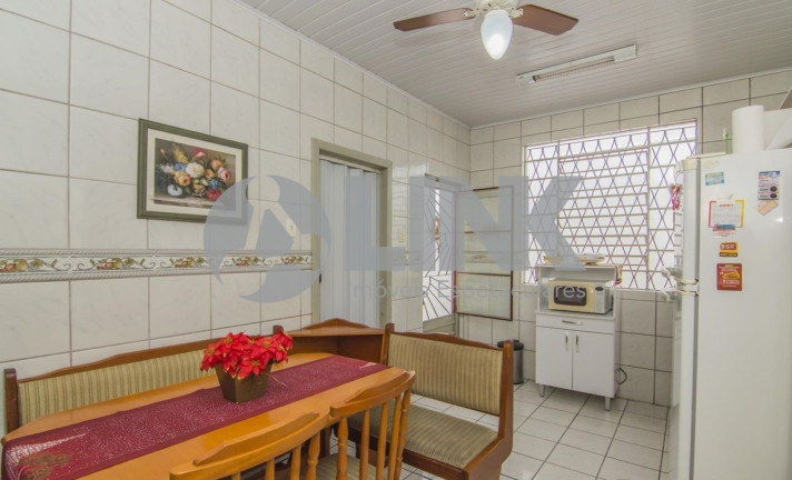 Imagem Casa com 3 Quartos à Venda, 90 m² em Santa Maria Goretti - Porto Alegre