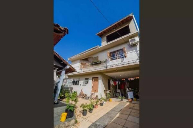Imagem Casa com 3 Quartos à Venda, 396 m² em Partenon - Porto Alegre Imagem Casa com 3 Quartos à Venda, 396 m² em Partenon - Porto Alegre