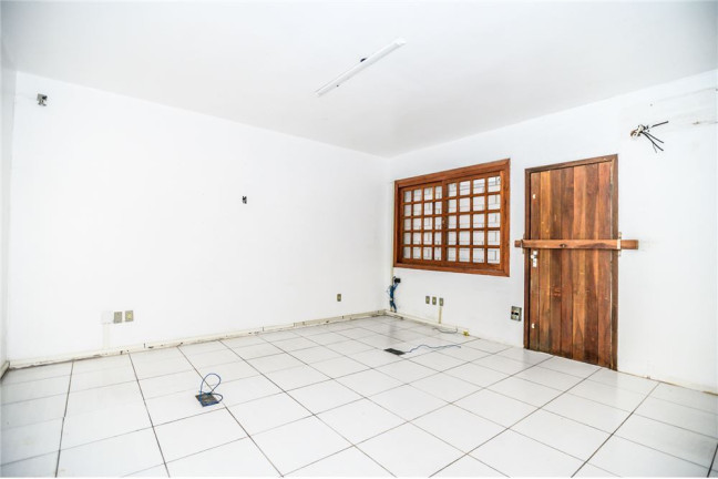 Imagem Casa com 6 Quartos à Venda,  em Passo Da Areia - Porto Alegre