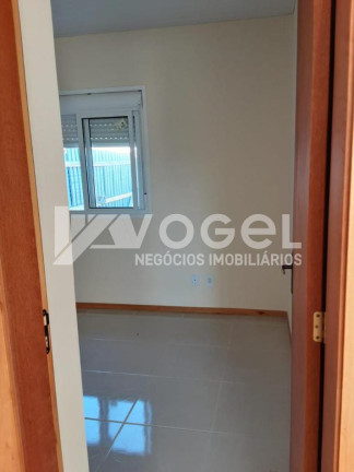 Imagem Casa com 2 Quartos à Venda, 40 m² em Três Marias - Esteio Imagem Casa com 2 Quartos à Venda, 40 m² em Três Marias - Esteio