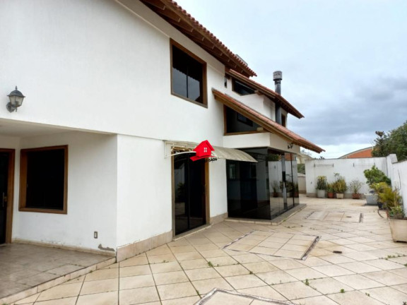 Imagem Casa com 7 Quartos à Venda, 657 m² em Anchieta - Porto Alegre