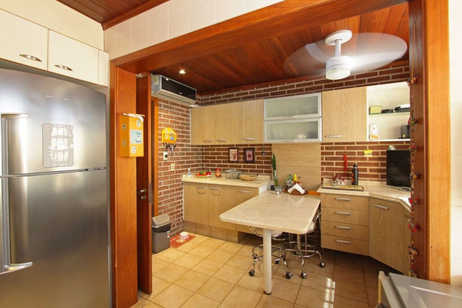 Imagem Casa com 3 Quartos à Venda, 355 m² em Santo Antônio - Porto Alegre Imagem Casa com 3 Quartos à Venda, 355 m² em Santo Antônio - Porto Alegre