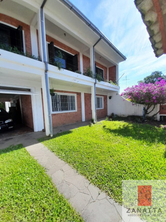 Imagem Casa com 6 Quartos à Venda, 276 m² em Centro - Esteio Imagem Casa com 6 Quartos à Venda, 276 m² em Centro - Esteio