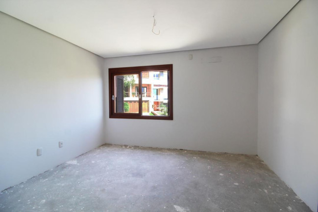 Imagem Casa com 3 Quartos à Venda, 240 m² em Vila Nova - Porto Alegre Imagem Casa com 3 Quartos à Venda, 240 m² em Vila Nova - Porto Alegre