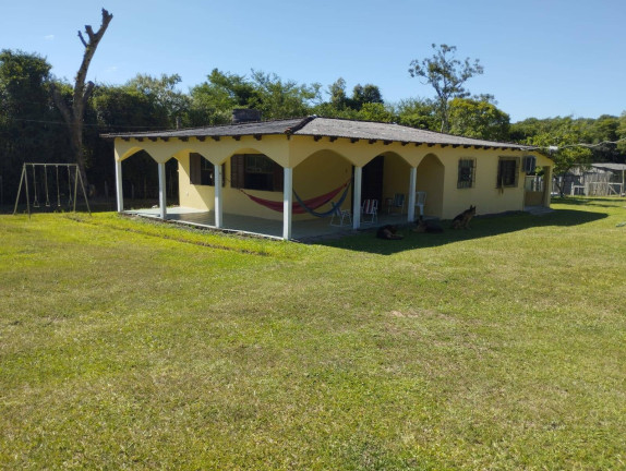 Imagem Chácara com 4 Quartos à Venda, 10.000 m² em Fiuza - Viamão