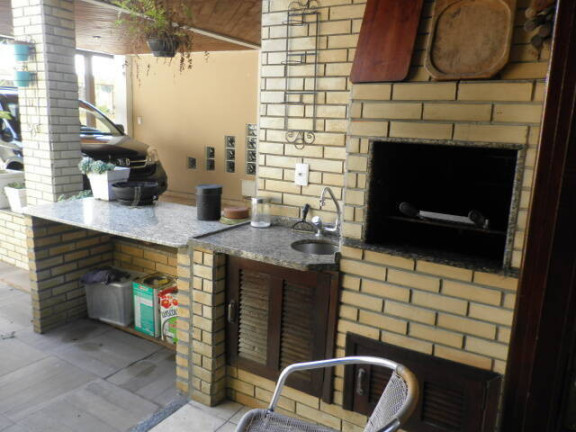 Imagem Casa com 4 Quartos à Venda, 256 m² em Santinho - Florianópolis
