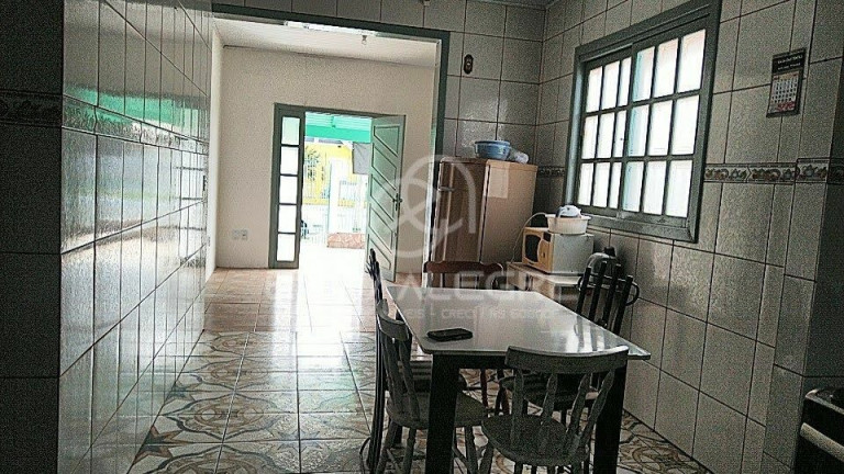 Imagem Casa com 3 Quartos à Venda, 150 m² em Harmonia - Canoas Imagem Casa com 3 Quartos à Venda, 150 m² em Harmonia - Canoas