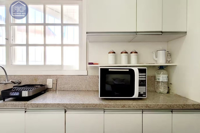 Imagem Casa com 3 Quartos à Venda, 266 m² em Vila Nova - Porto Alegre